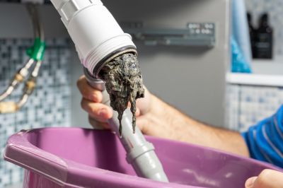 Drain Cleaning in Progress